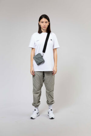 Long light green cargo style pants with elasticized waistband and ankle.